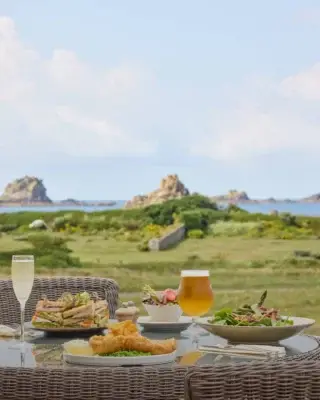 Sea views, summer plates and a glass of something chilled...

Lunch at Hell Bay is open to everyone, every day - whether you’re staying with us, exploring Bryher, or making the short hop from elsewhere in the archipelago.

Crab sandwich? Classic bouillabaisse? Crispy gnocchi? What's your favourite dish from our lunch menu?

#HellBayHotel #Bryher #IslesOfScilly #LunchWithAView #IslandDining